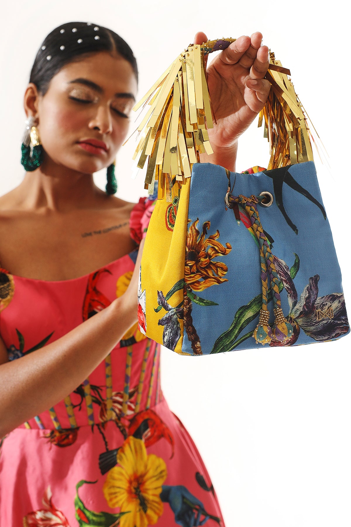 Multicolor bucket bag with golden tassel handle